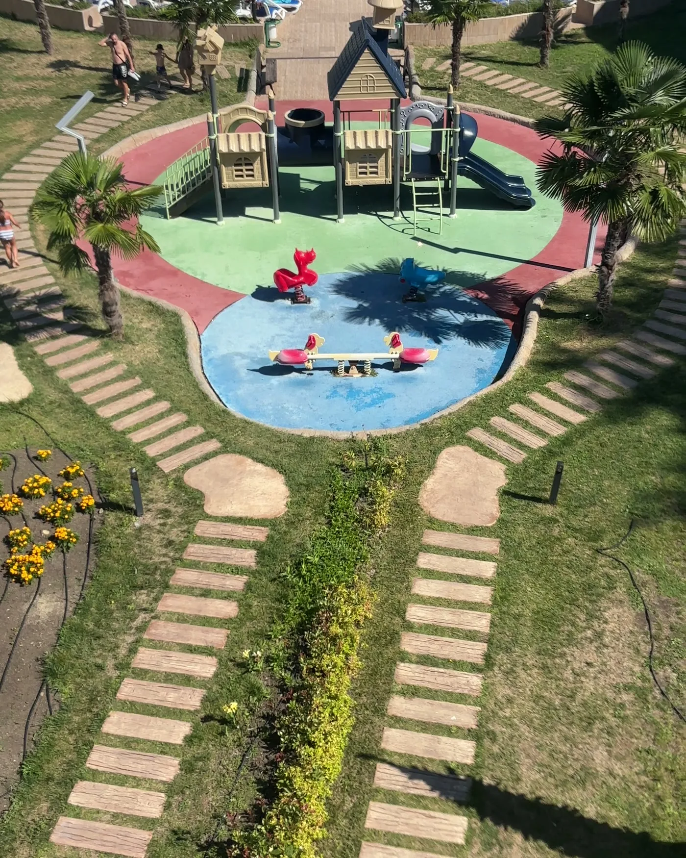 Children's playground in the garden at Hotel Kotva
